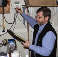 technician reading meters